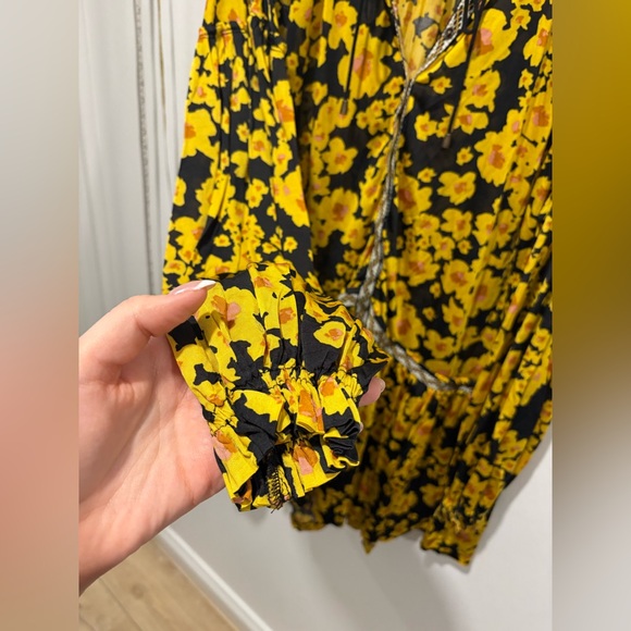 Free People Love Letter Floral Tunic Blouse in a black and yellow floral print. - Picture 7 of 11